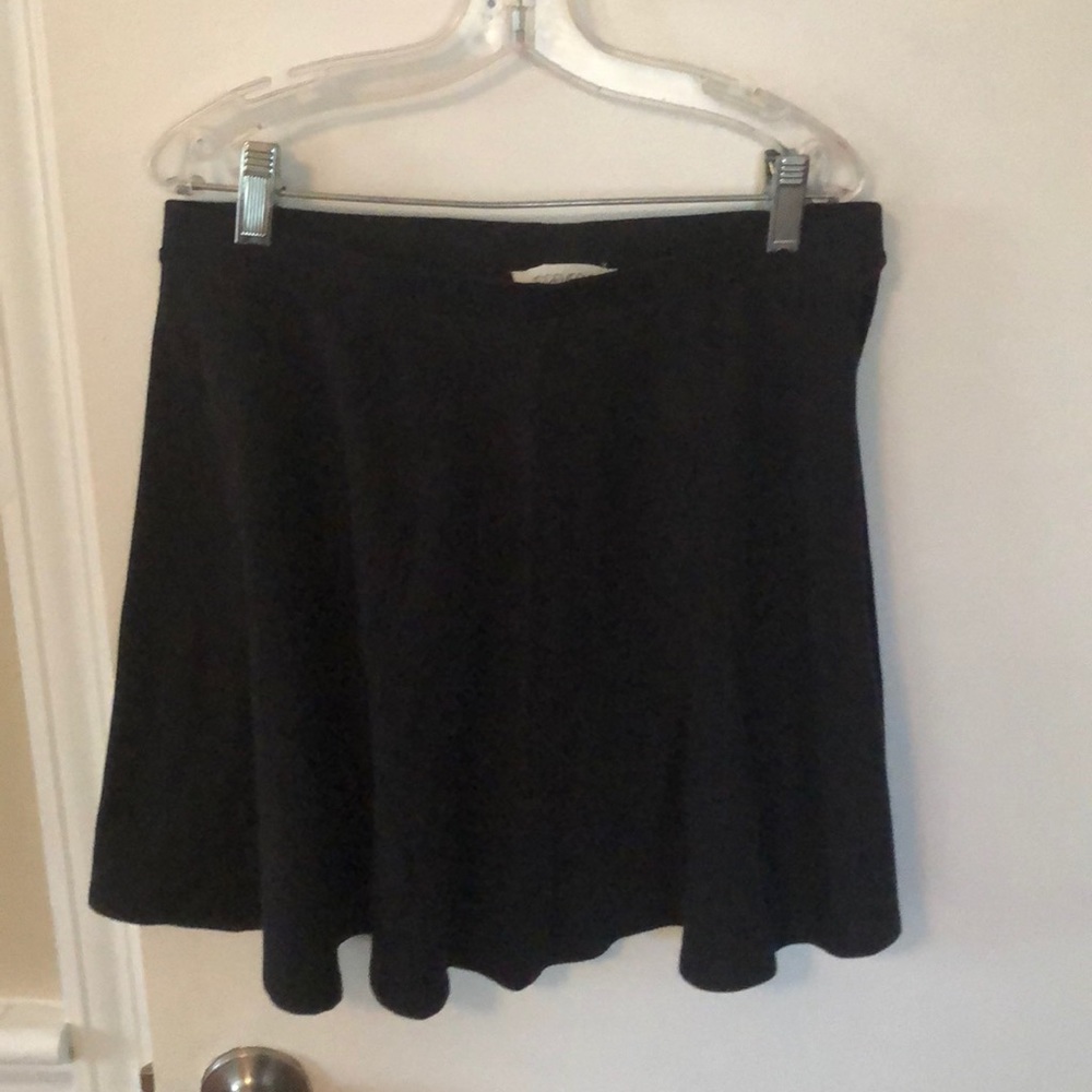 Black stretchy flared mini skirt